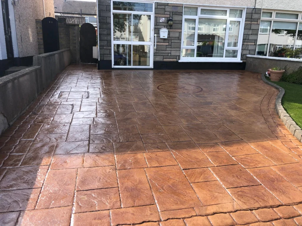 Concrete driveway finished with colour hardener for durability by Concrete Driveways Dublin